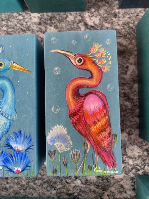 Glücksvogel Rot/Orange/Pink März 2026