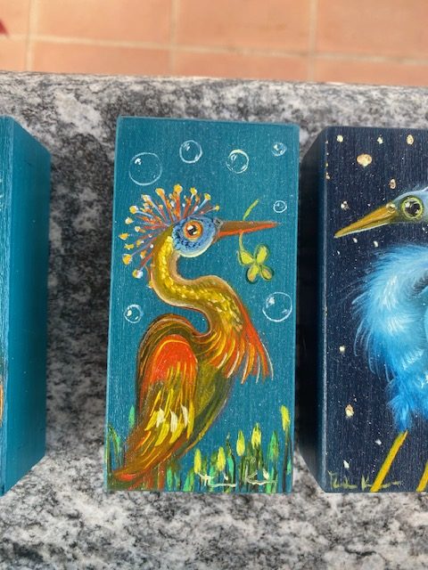 Glücksvogel Pfau Goldgelborange mit Seifenblasen März 2026